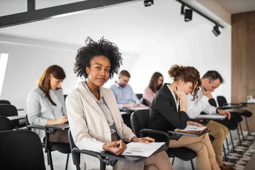 People having education at one company, sitting and learning.